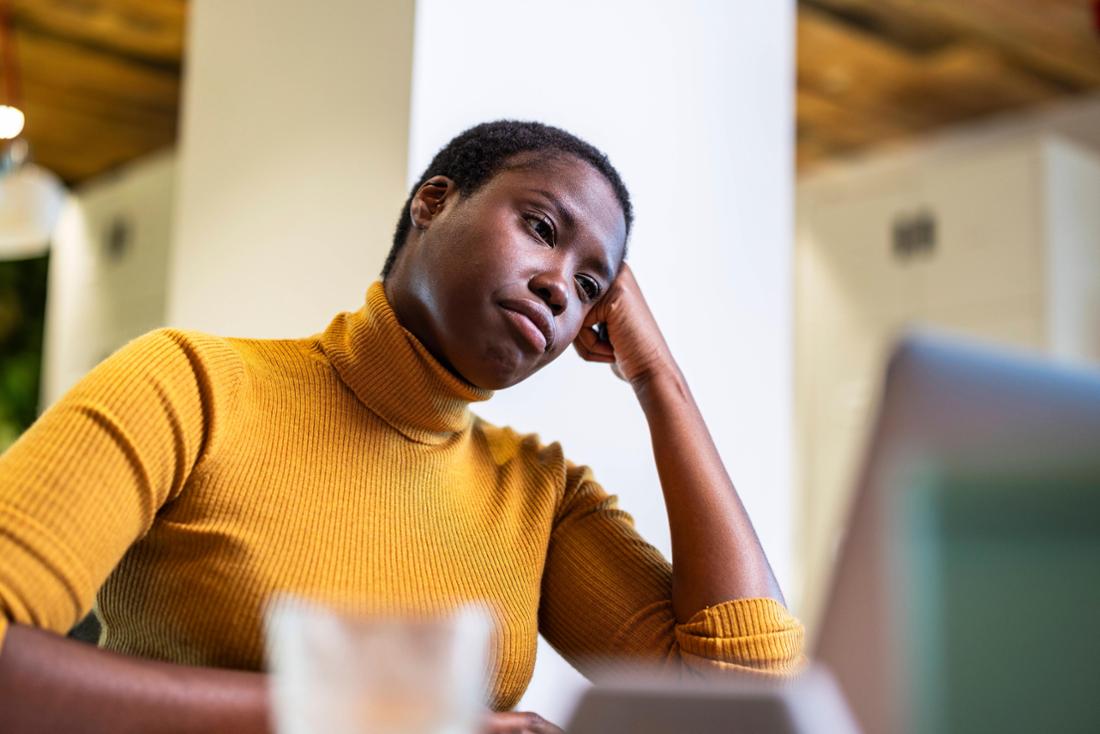 Young woman tired of computer. 